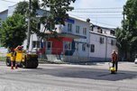 Места перекопов после укладки газопровода асфальтируют в Уссурийске